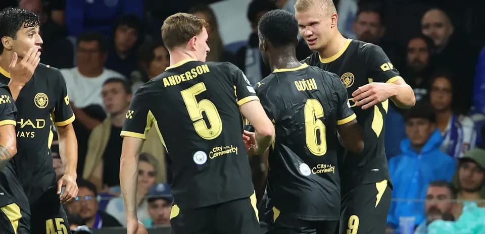 Players celebrating after a goal during match