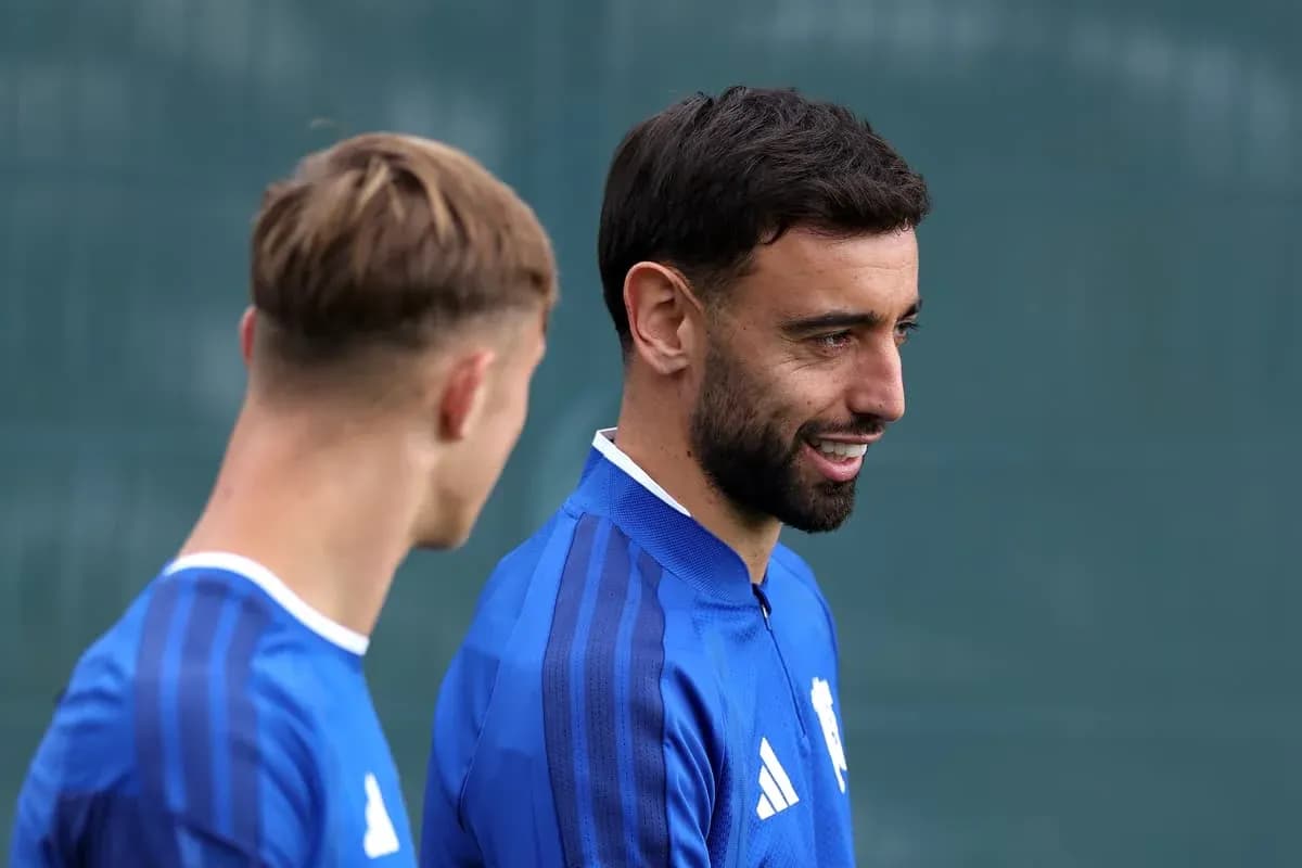 Two players in blue kits during training session