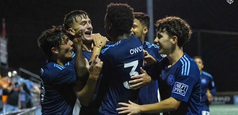 New York City II players celebrating a goal