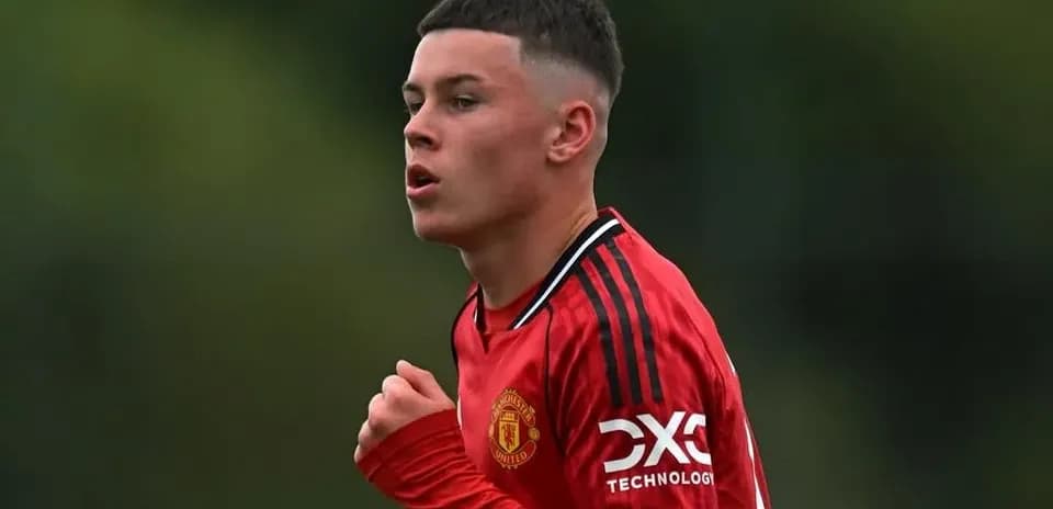 Player in red Manchester United kit during match