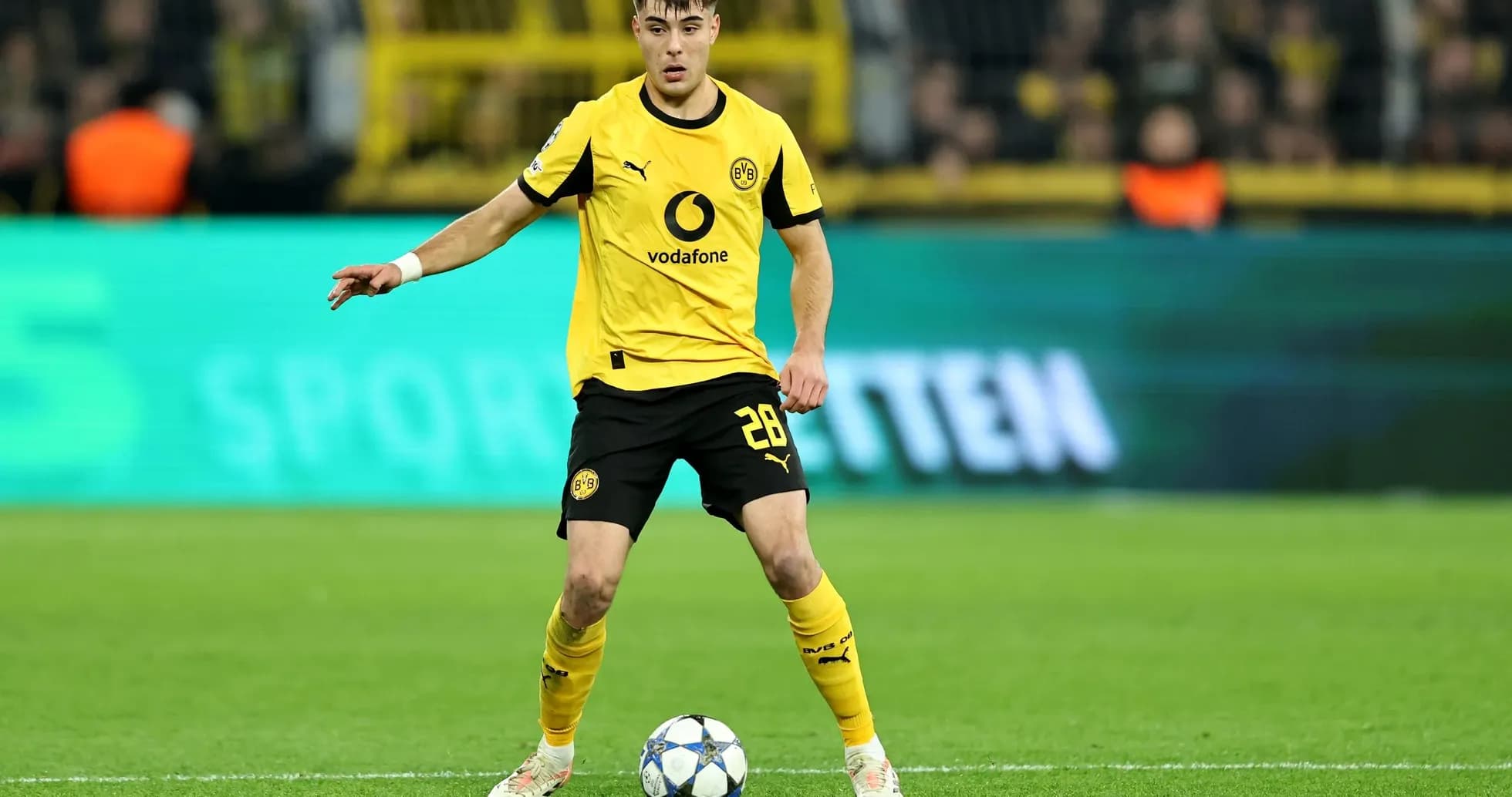 Borussia Dortmund player preparing for a free kick