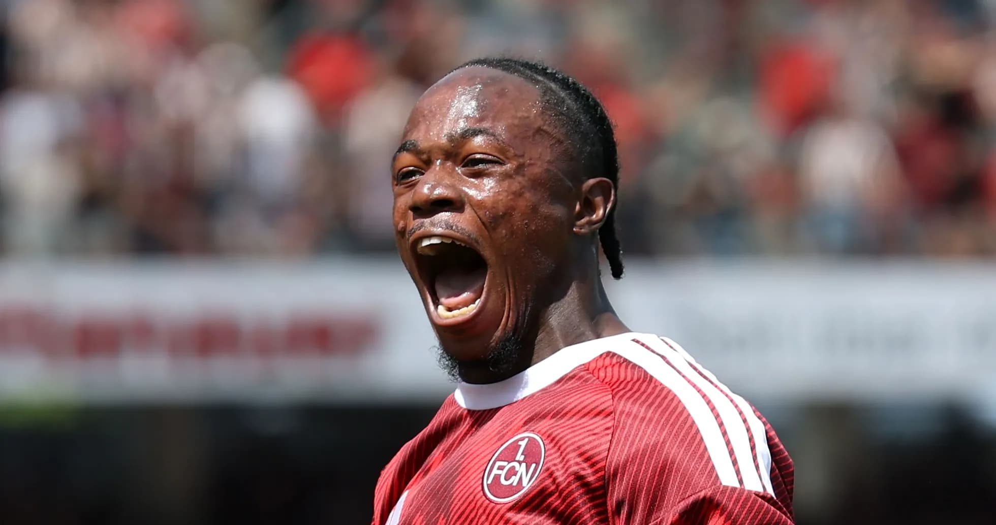 Player celebrating a goal on the field
