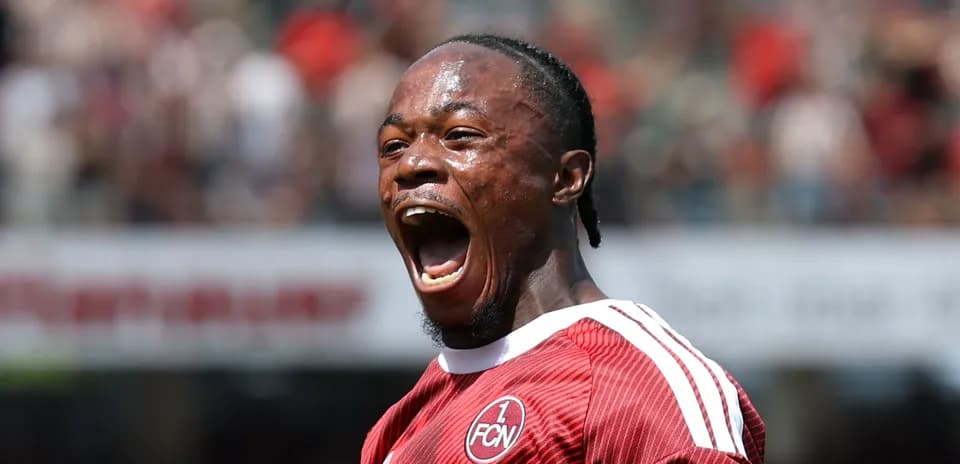 Player celebrating a goal on the field