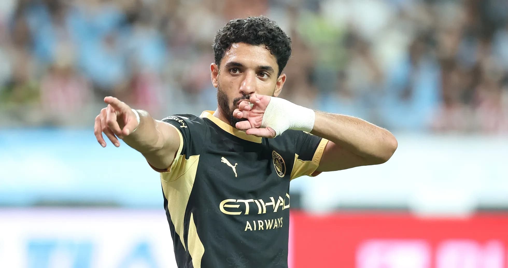 Player celebrating and pointing during a match