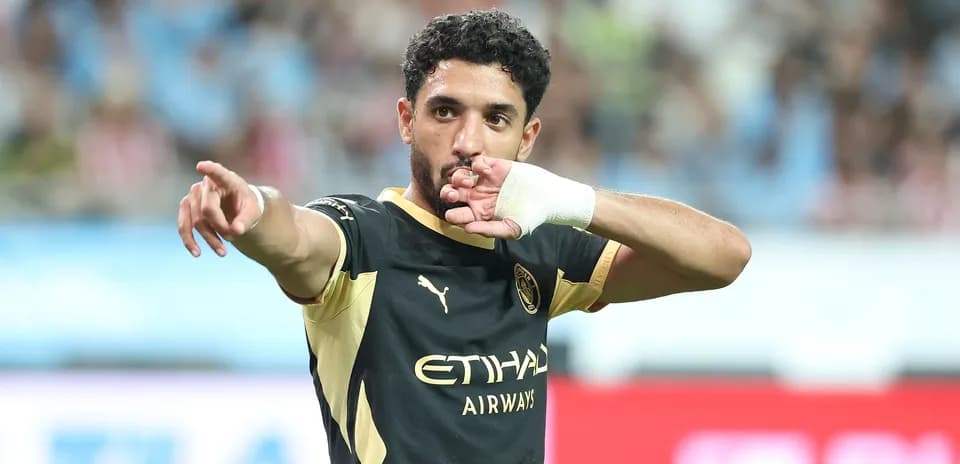 Player celebrating and pointing during a match