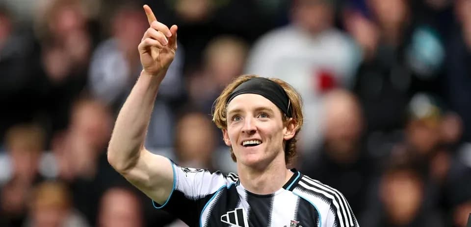 Player celebrating and pointing during match