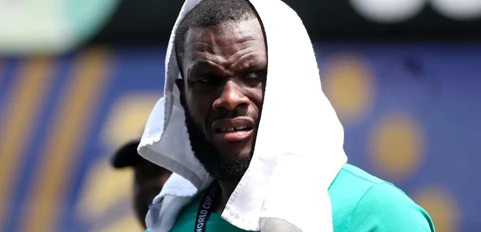 Athlete with towel on head during training session