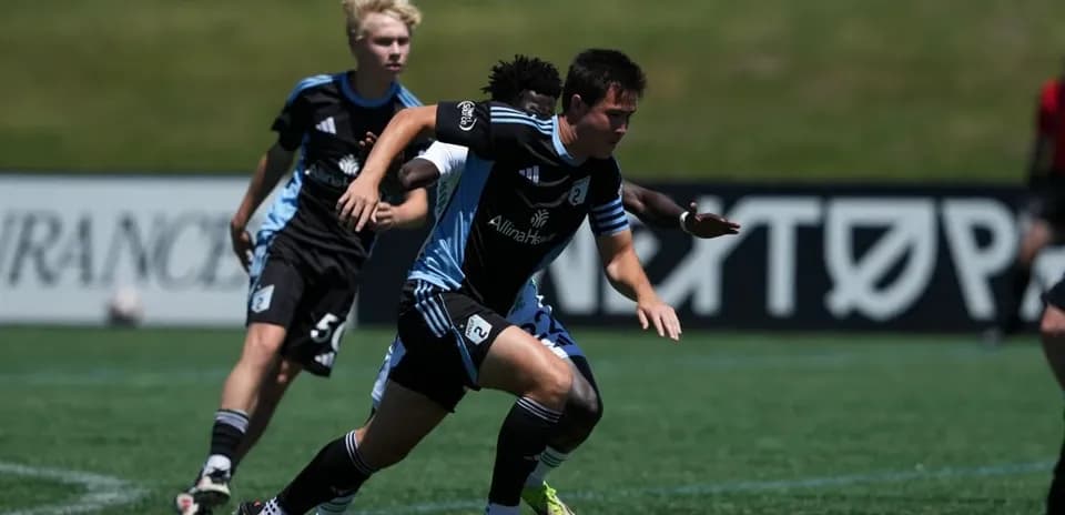 Player dribbling the ball during MLS Next Pro match
