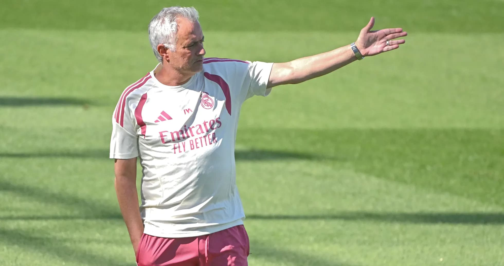Coach directing players during training session