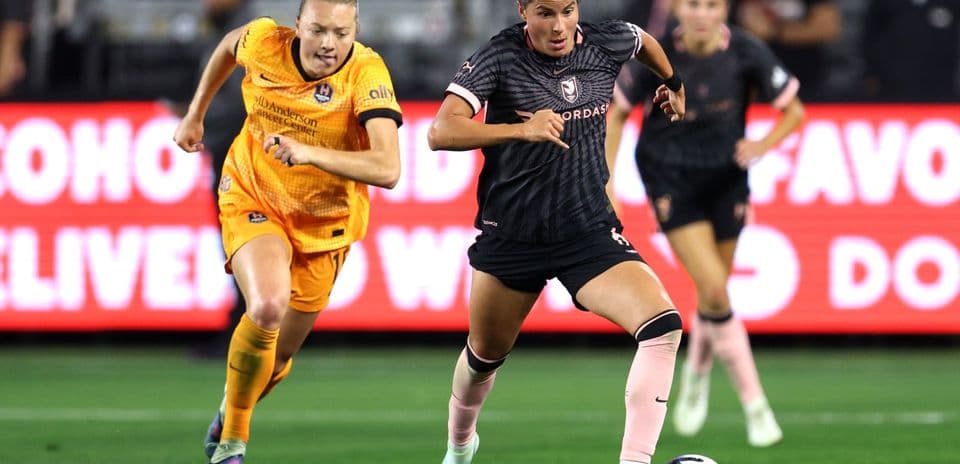 Two players competing during NWSL match