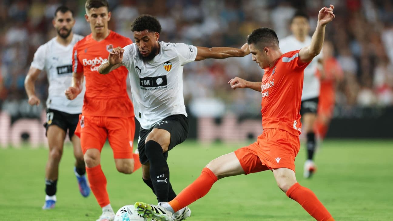 Players battling for the ball during La Liga match