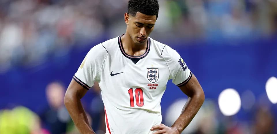 Player in England kit with head down during match