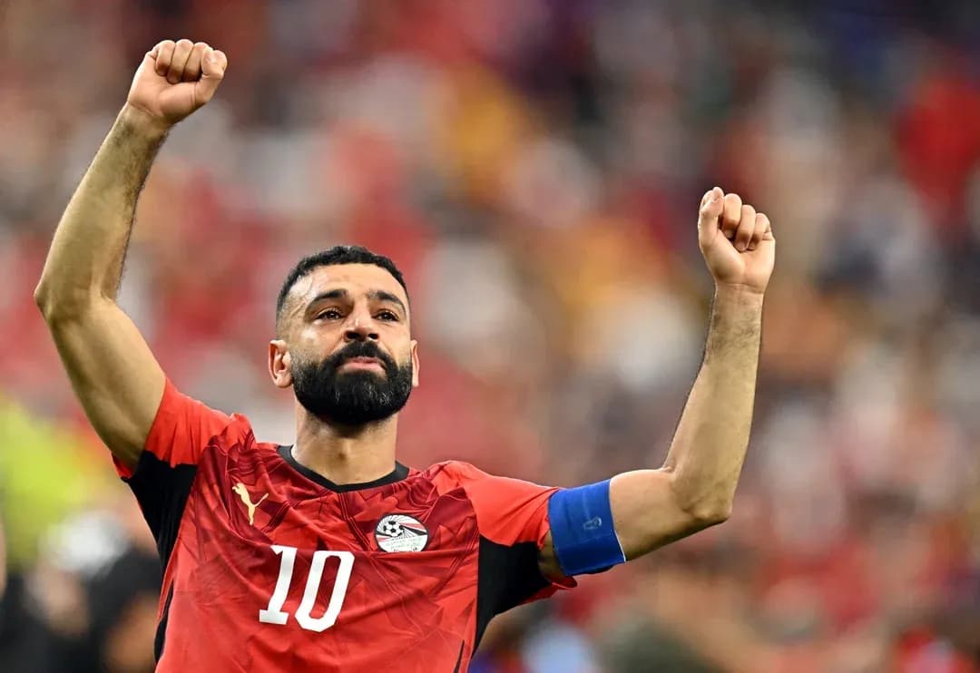Player celebrating with raised fists during match