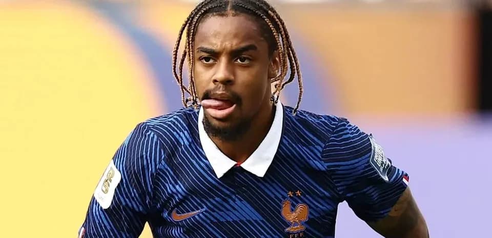 Player in France jersey during soccer match