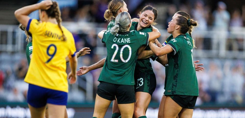 Utah Royals players celebrating a goal