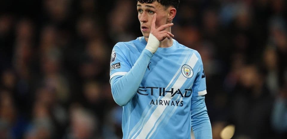 Player gesturing during Manchester City match