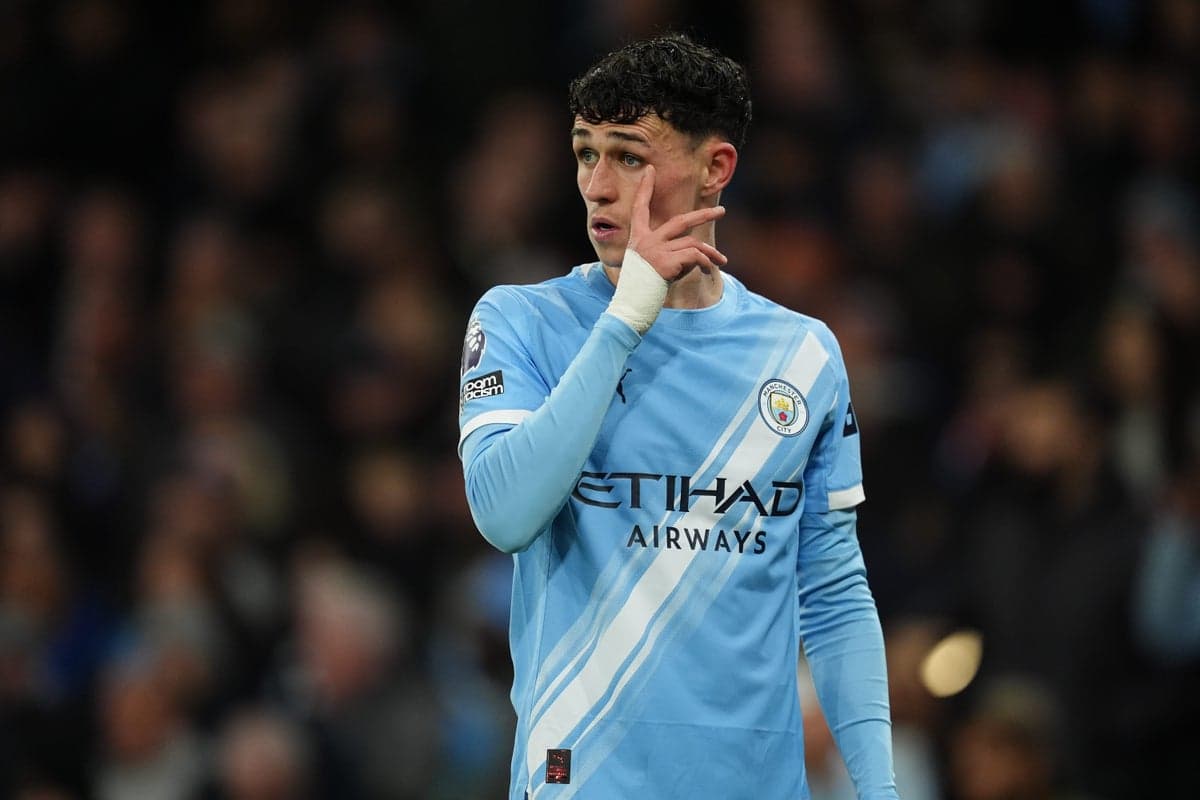 Player gesturing during Manchester City match