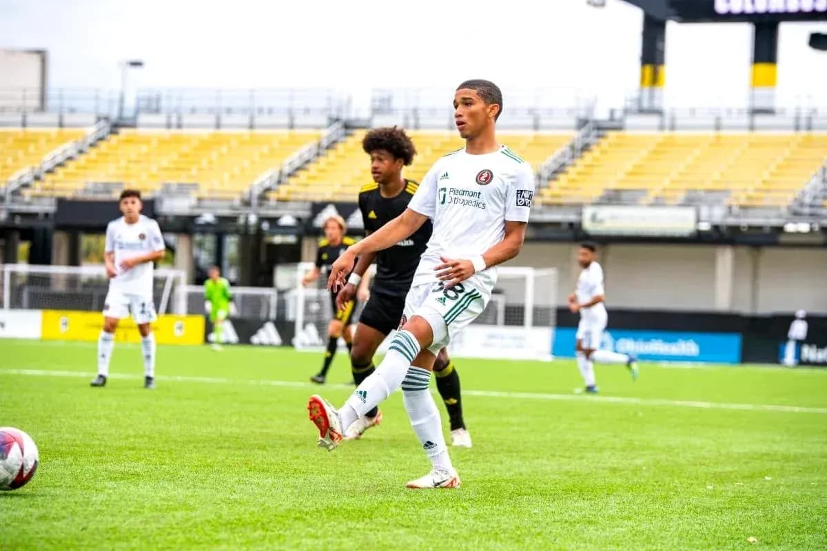 Columbus Crew II player kicking the ball