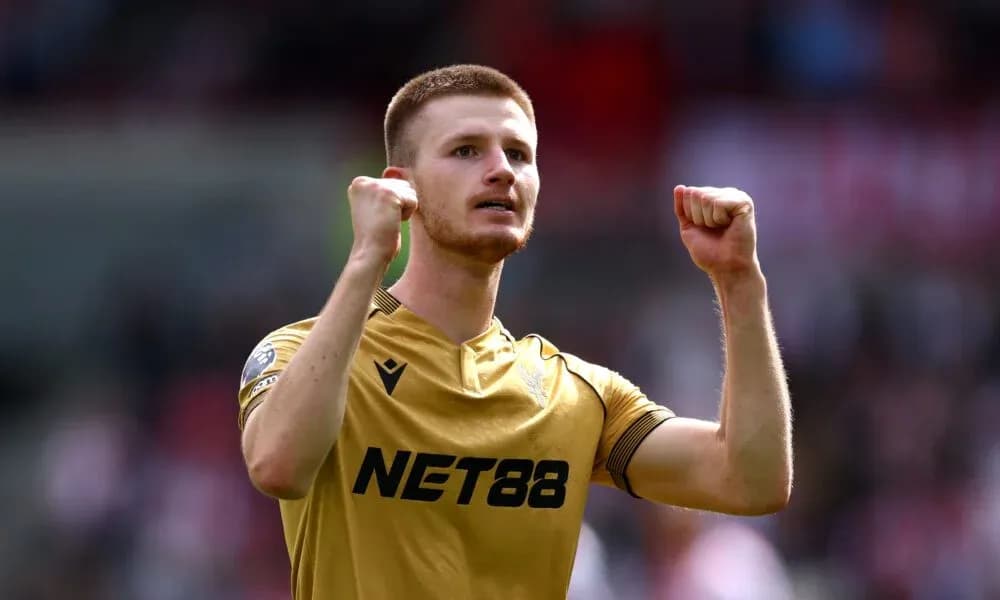 Player celebrating with raised fists after match