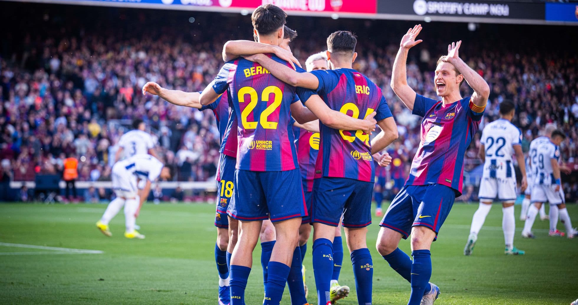 Barcelona players celebrating a goal during match