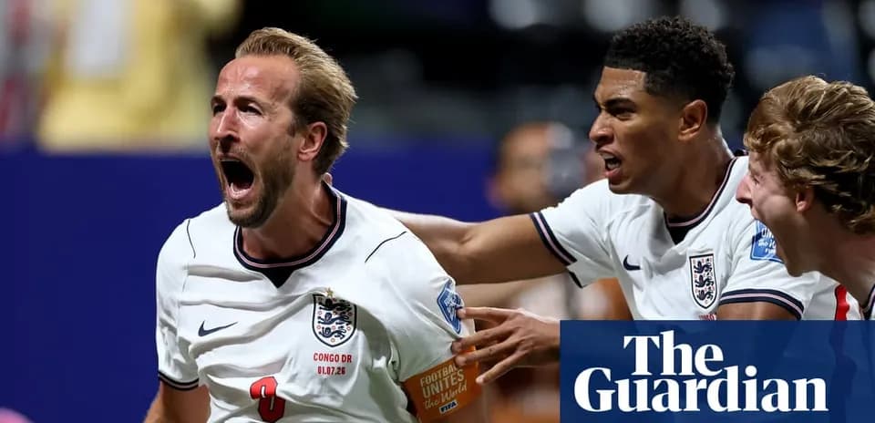 Harry Kane celebrating a goal with teammates