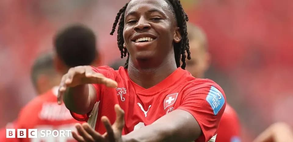 Player celebrating during a match in red jersey