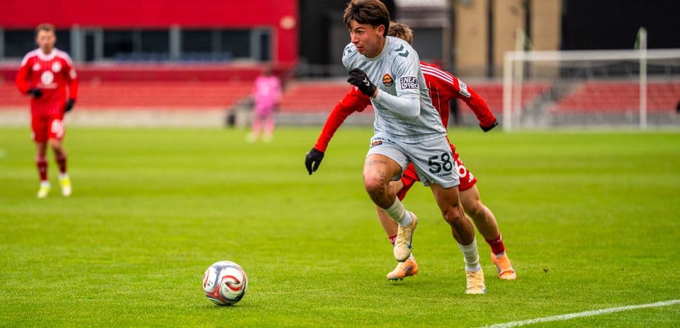 Player dribbling the ball during match
