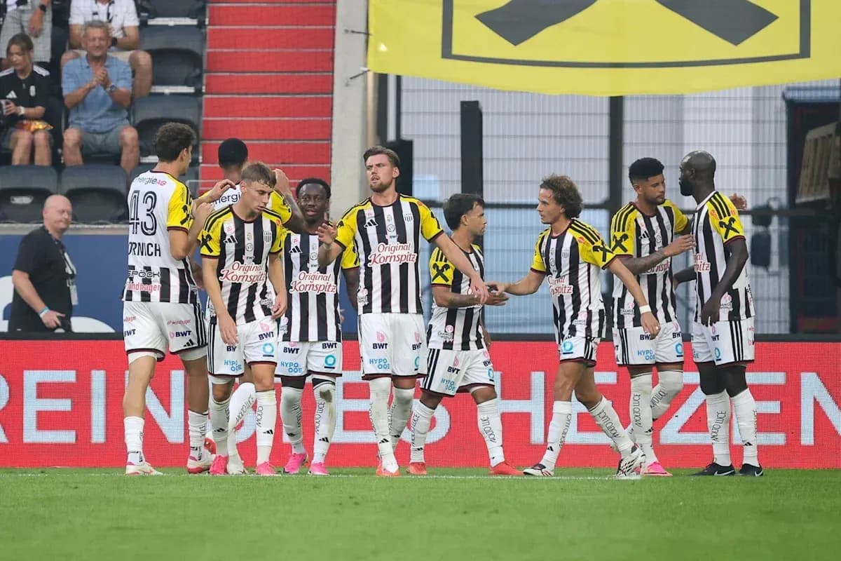 Team celebrating a goal on the field