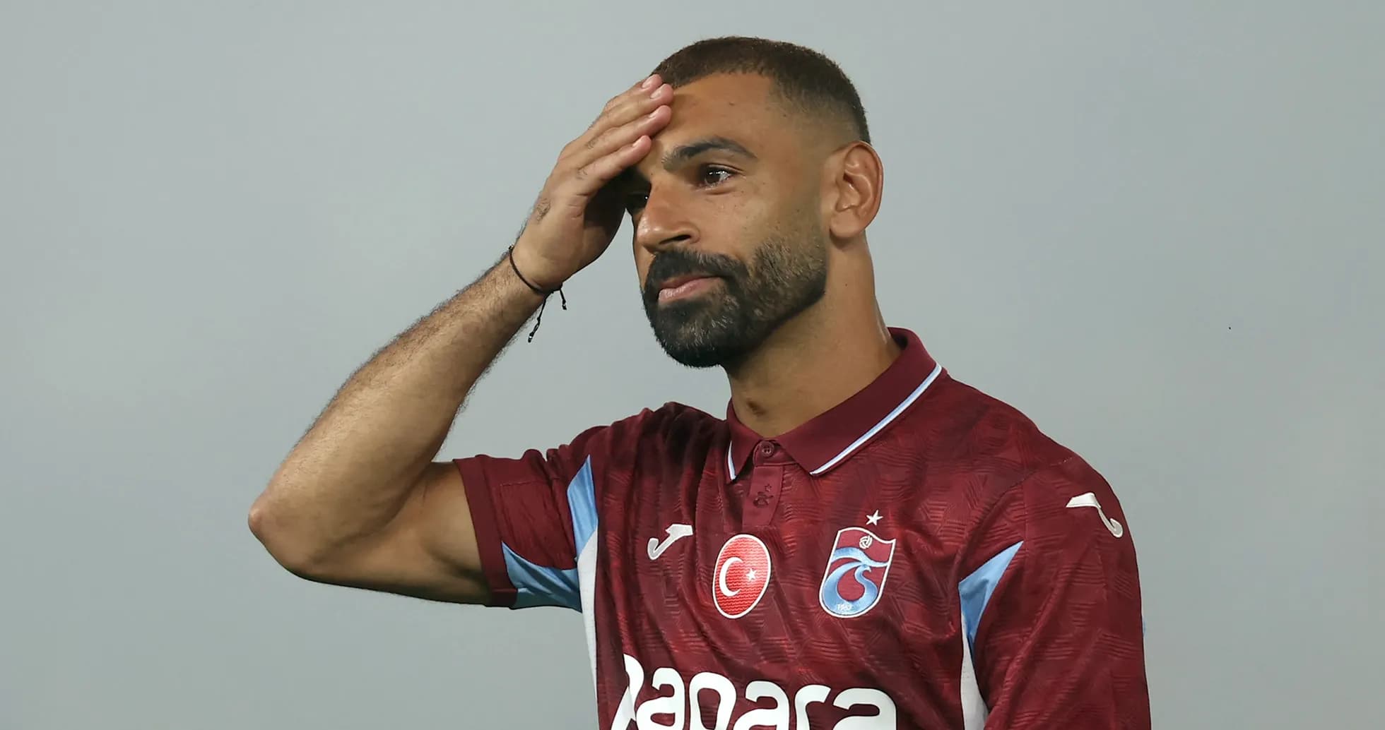 Player wearing Trabzonspor jersey during presentation event