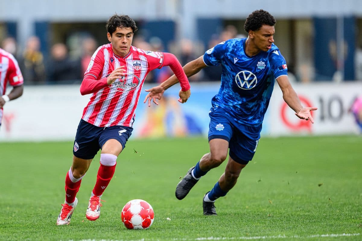 Player sprinting with ball during match