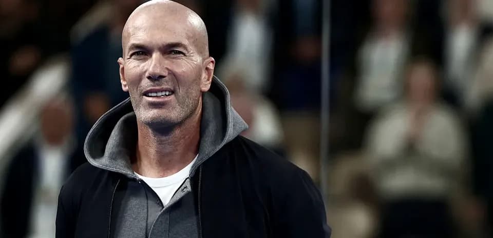 Man in casual attire smiling at event