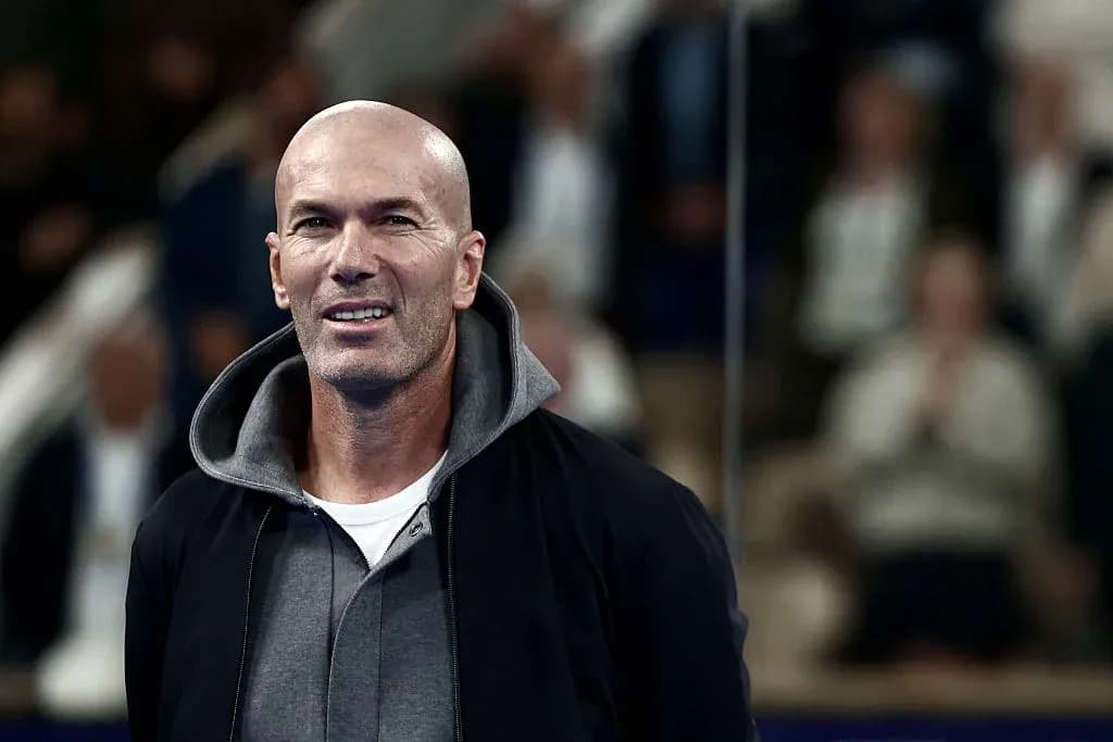 Man in casual attire smiling at event