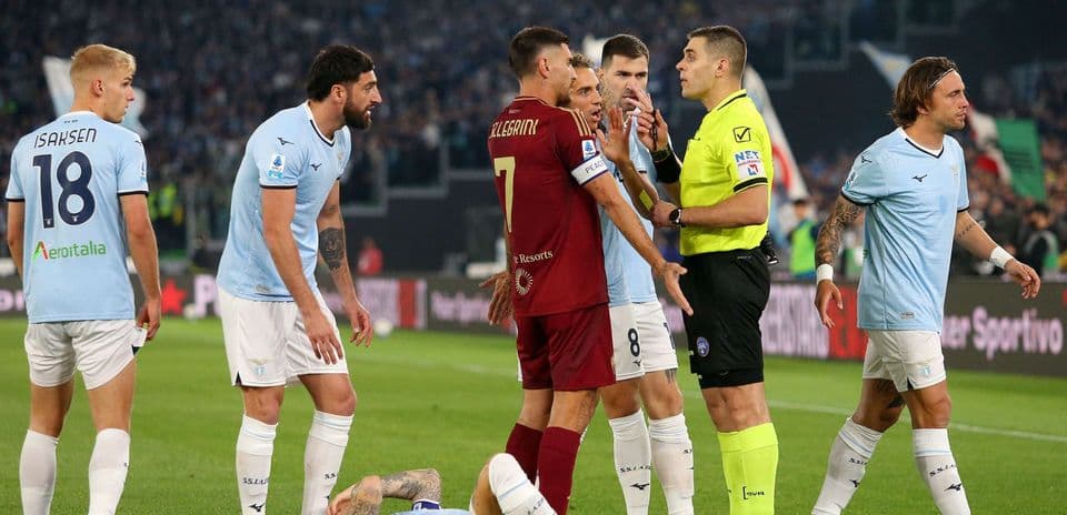 Players arguing with referee during AS Roma vs Lazio match