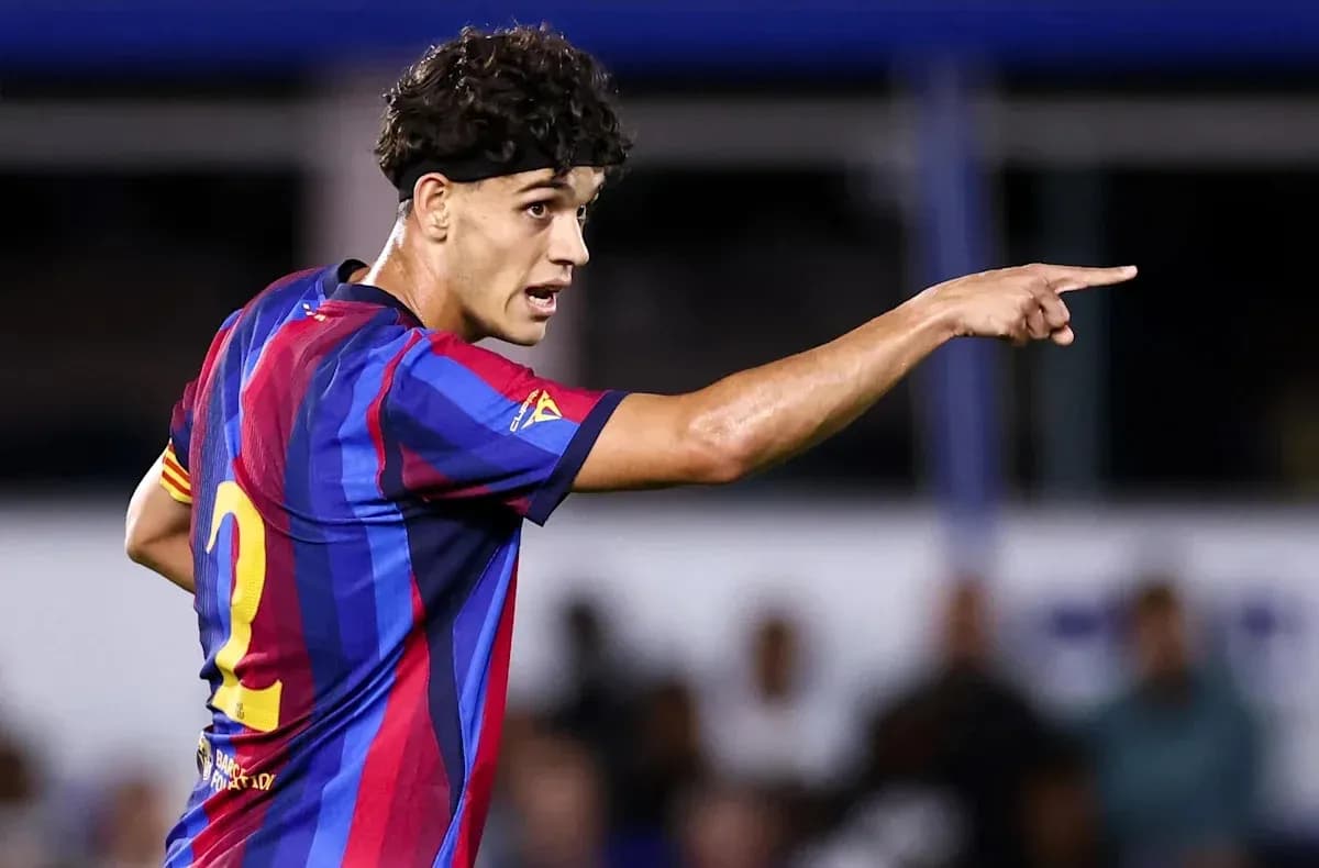 Player gesturing during a match in Barcelona kit