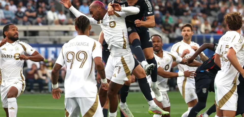 Players competing for the ball during LAFC match