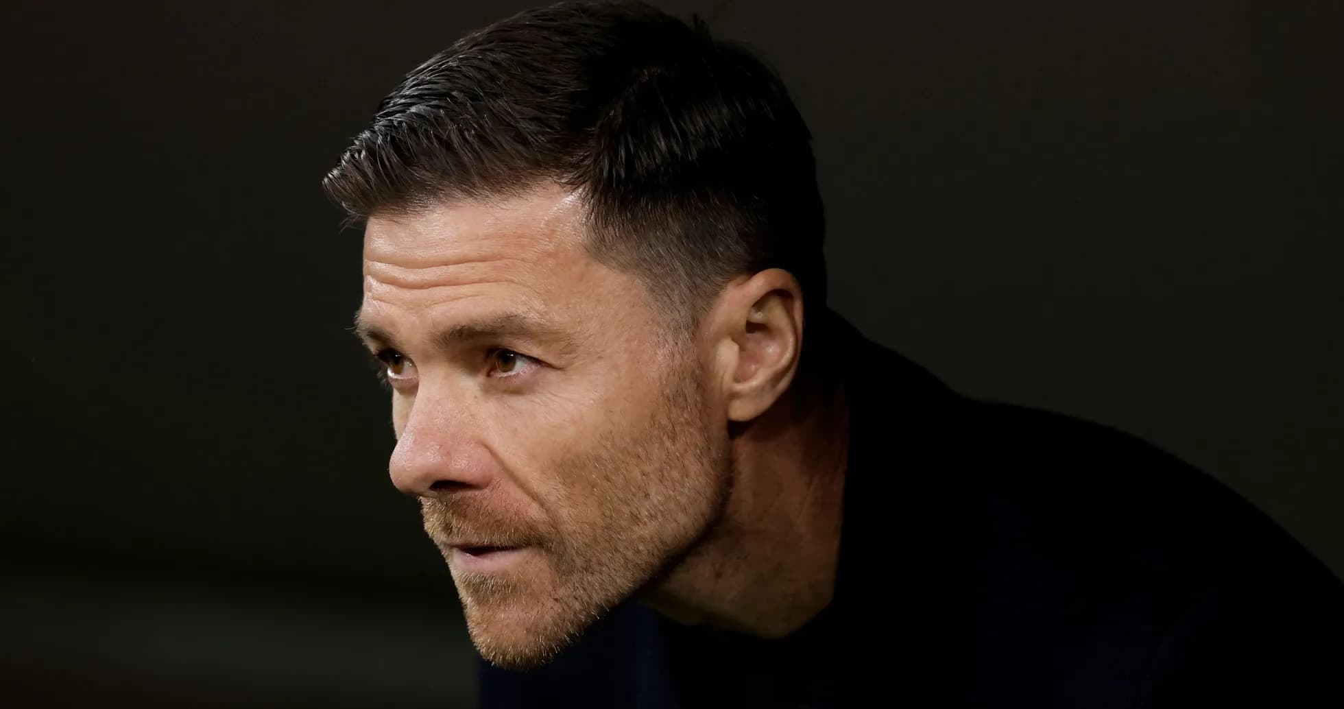 Coach observing the match from the sidelines