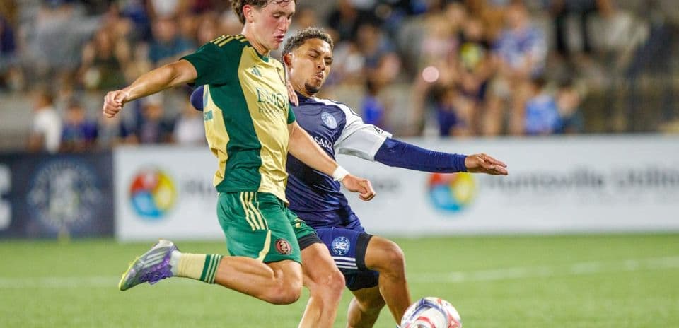 Player from Huntsville City dribbling the ball