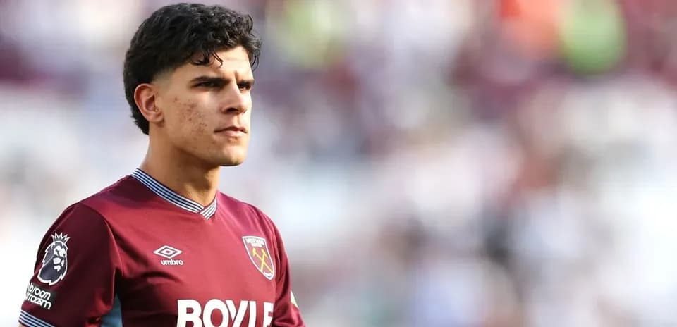 Player in West Ham United jersey on the pitch