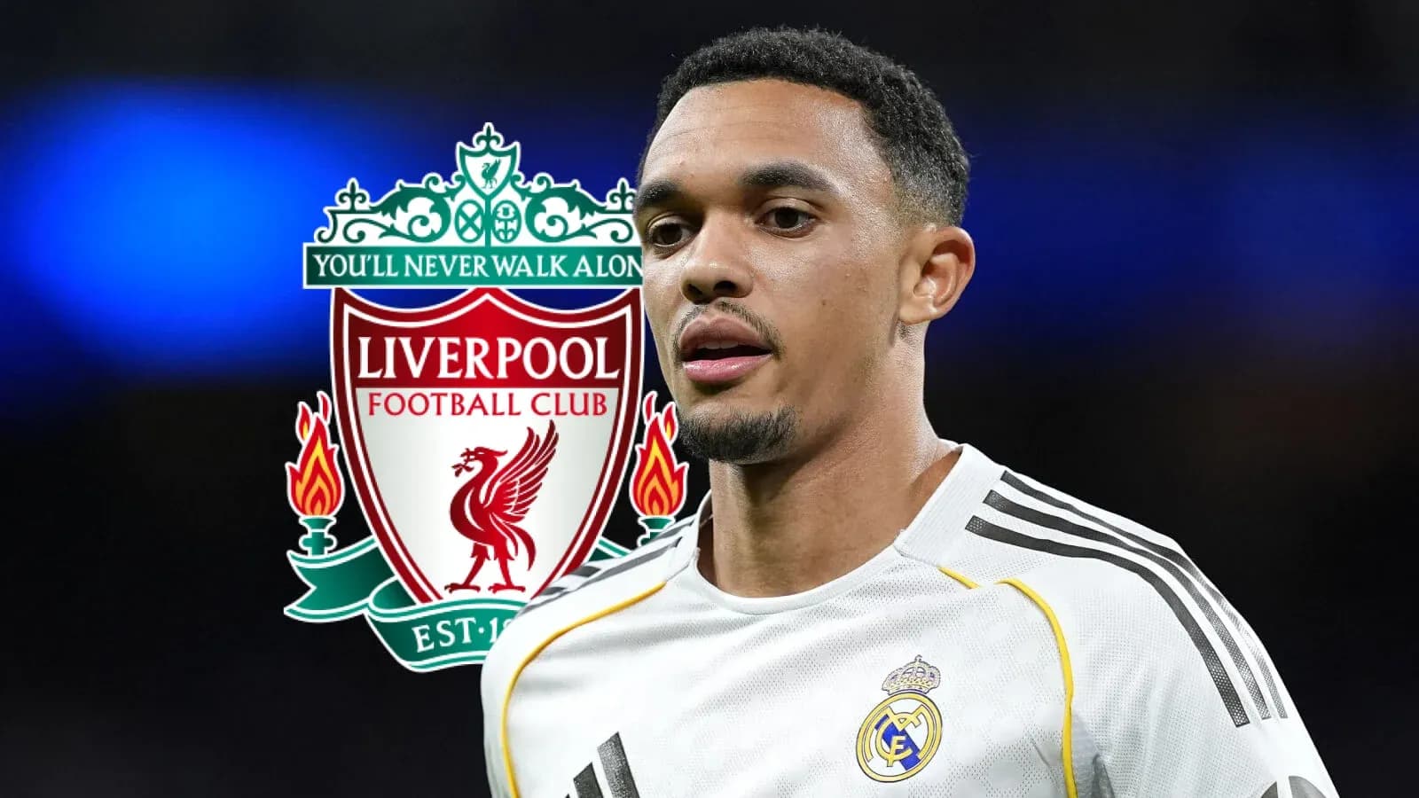 Player in white jersey with Liverpool logo background