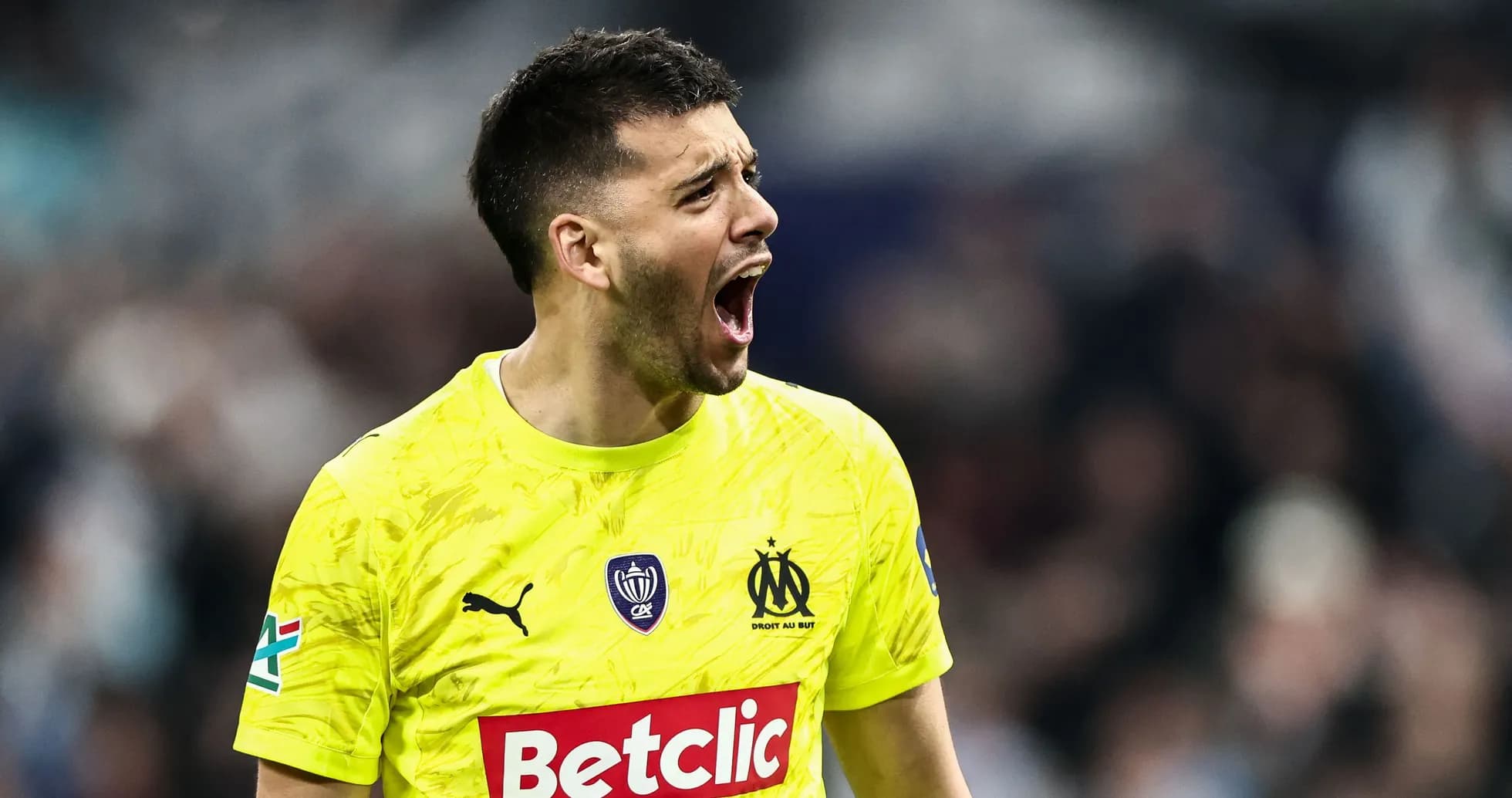 Goalkeeper celebrating during match with fans