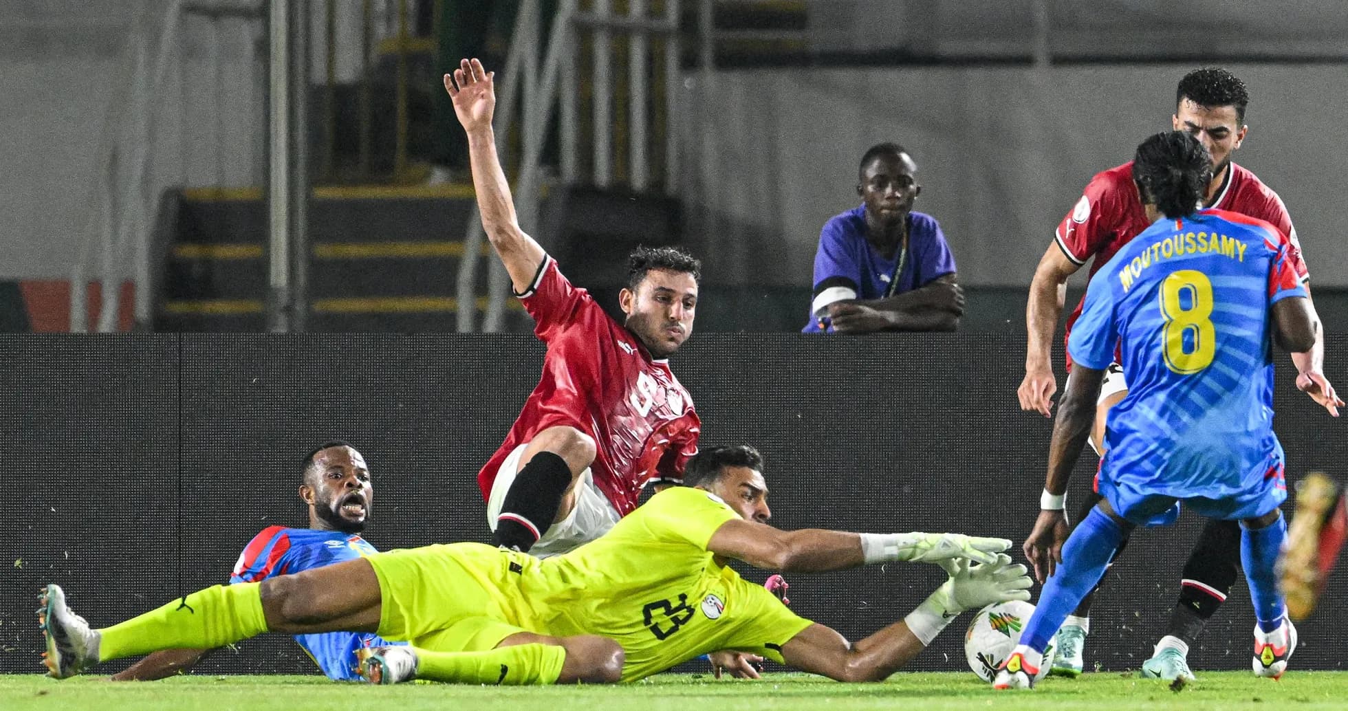 Players contesting for the ball during match action