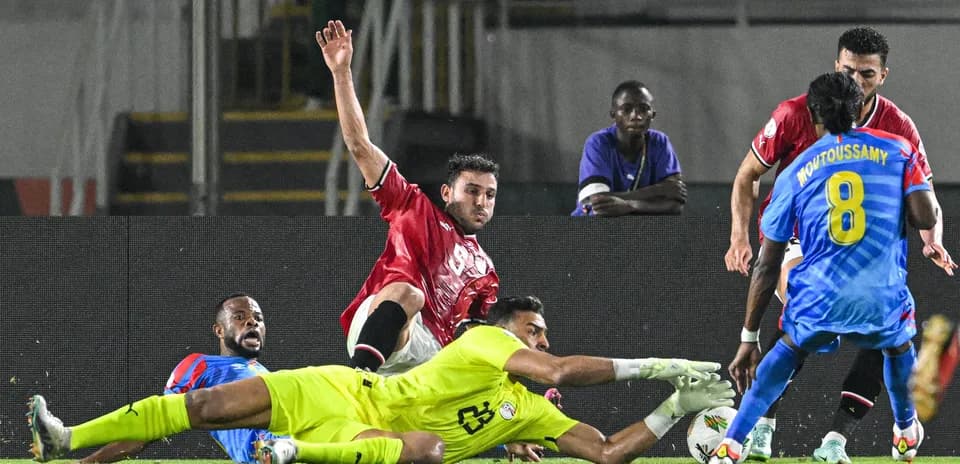 Players contesting for the ball during match action