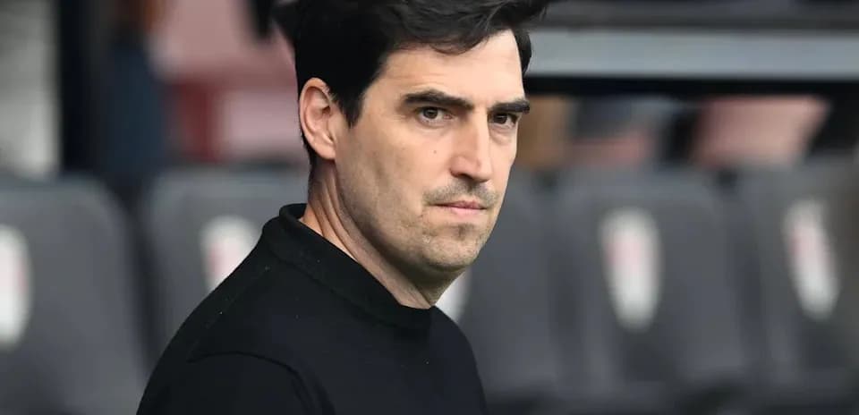 Manager observing the match from the sidelines