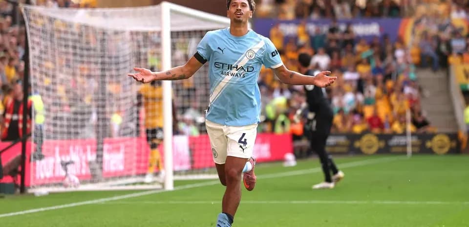 Player celebrating a goal on the field