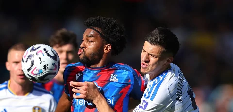 Player from Crystal Palace battling for the ball