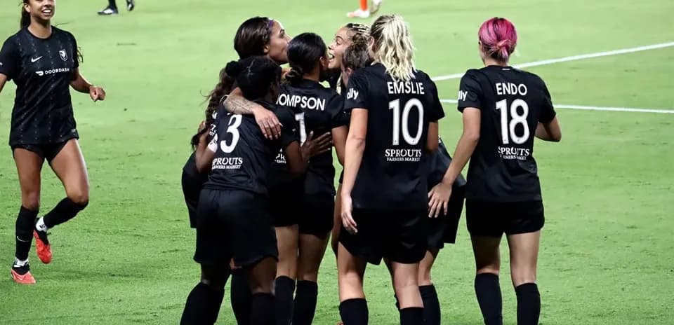 Celebration of Angel City players after scoring