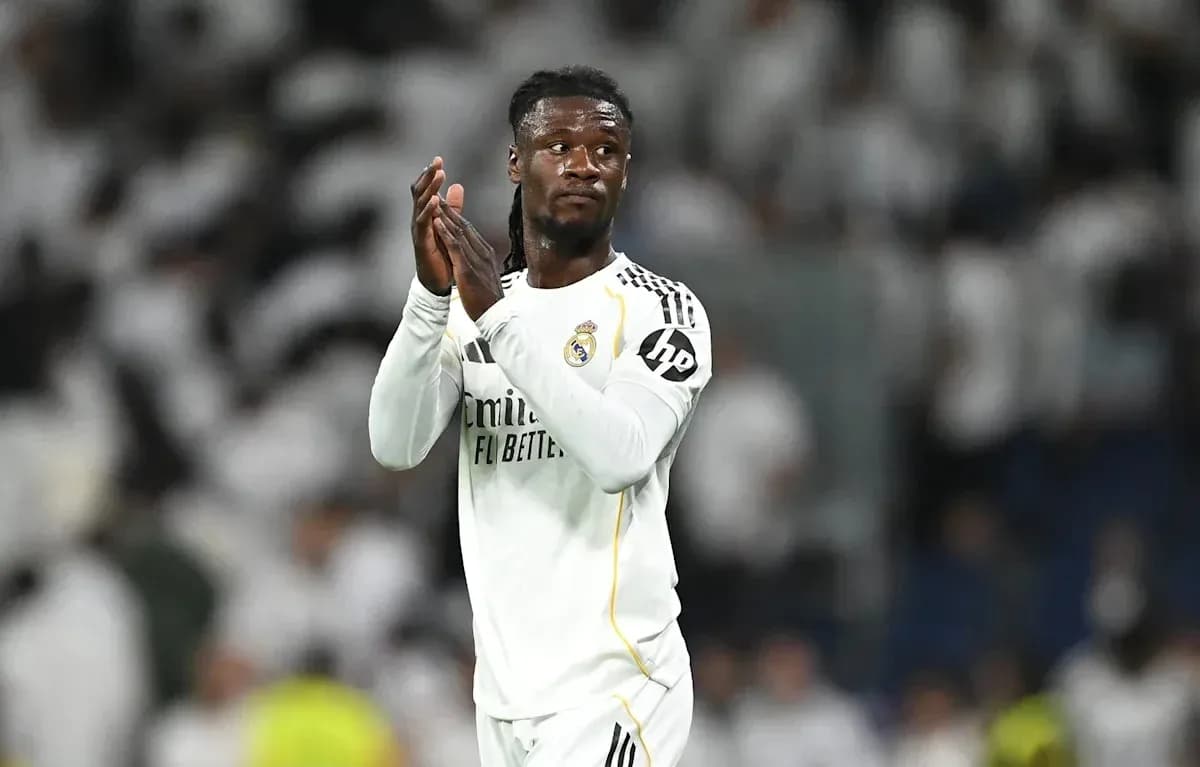 Player applauding fans after match in stadium