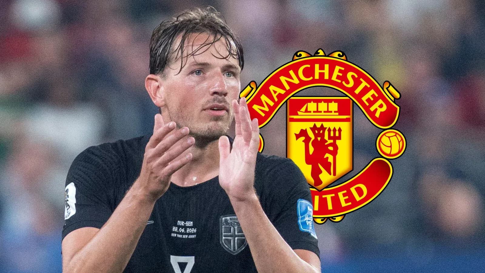 Player applauding with Manchester United logo background