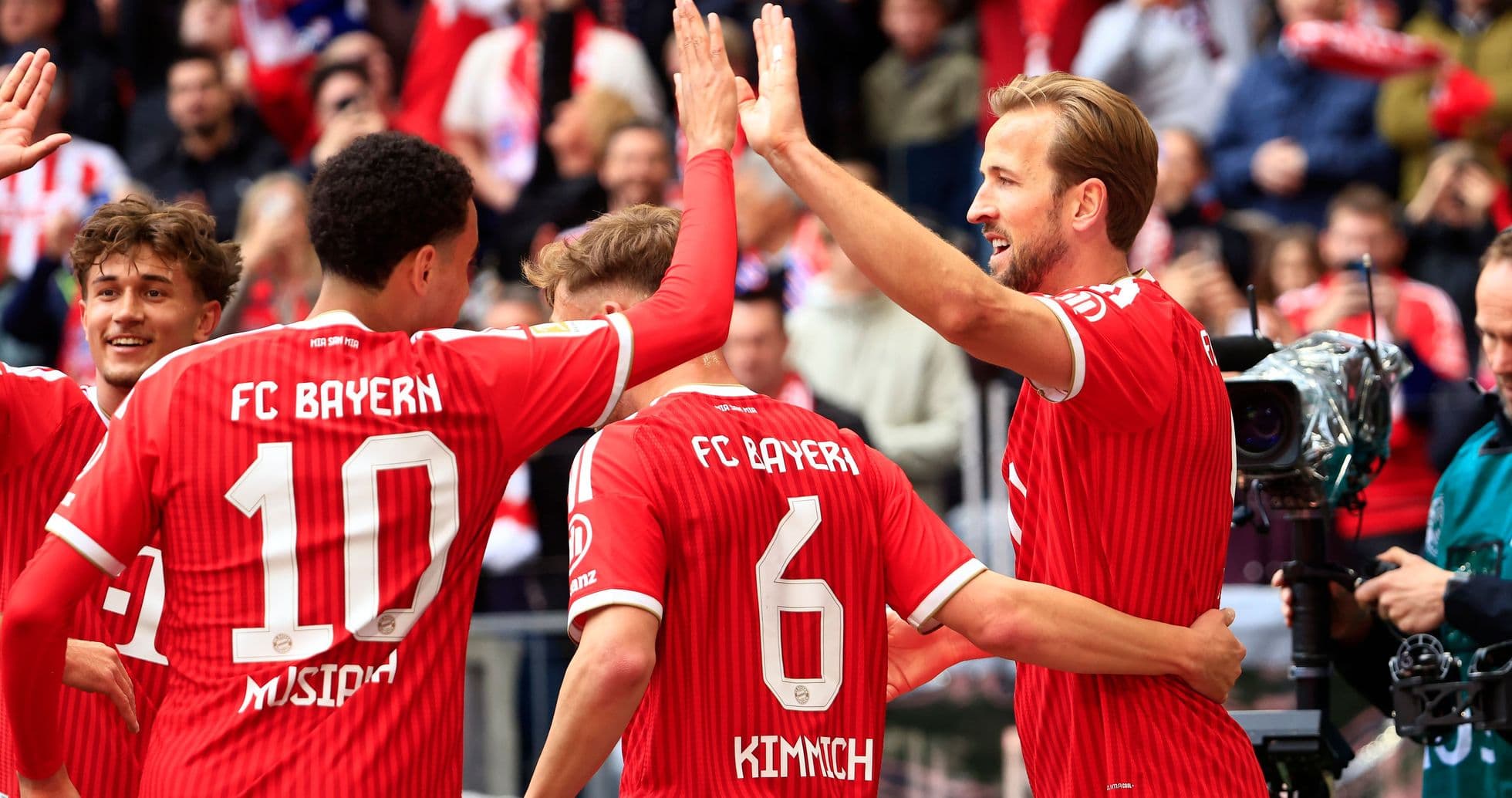 Bayern players celebrating a goal together