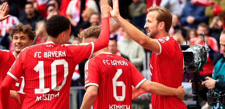 Bayern players celebrating a goal together
